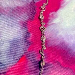 Musical silver tone bracelet for women